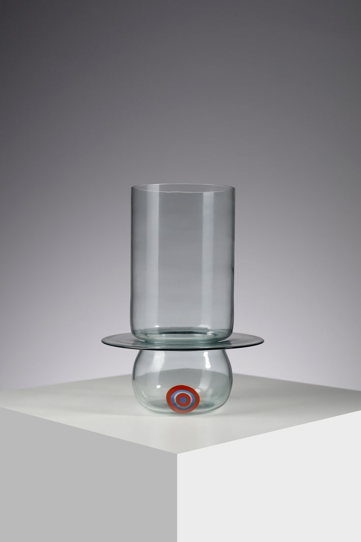 GIANMARIA POTENZA S/220 candle holder for La Murrina, Murano.: POTENZA GIANMARIA (n. 1936) S/220 candle holder for La Murrina, Murano. Green glass decorated with polychrome murrina.. Cm 18,00 x 25,50 x 18,00. 1960s.Literature: La Murrina, catalogo d'epoca n. 1 (a