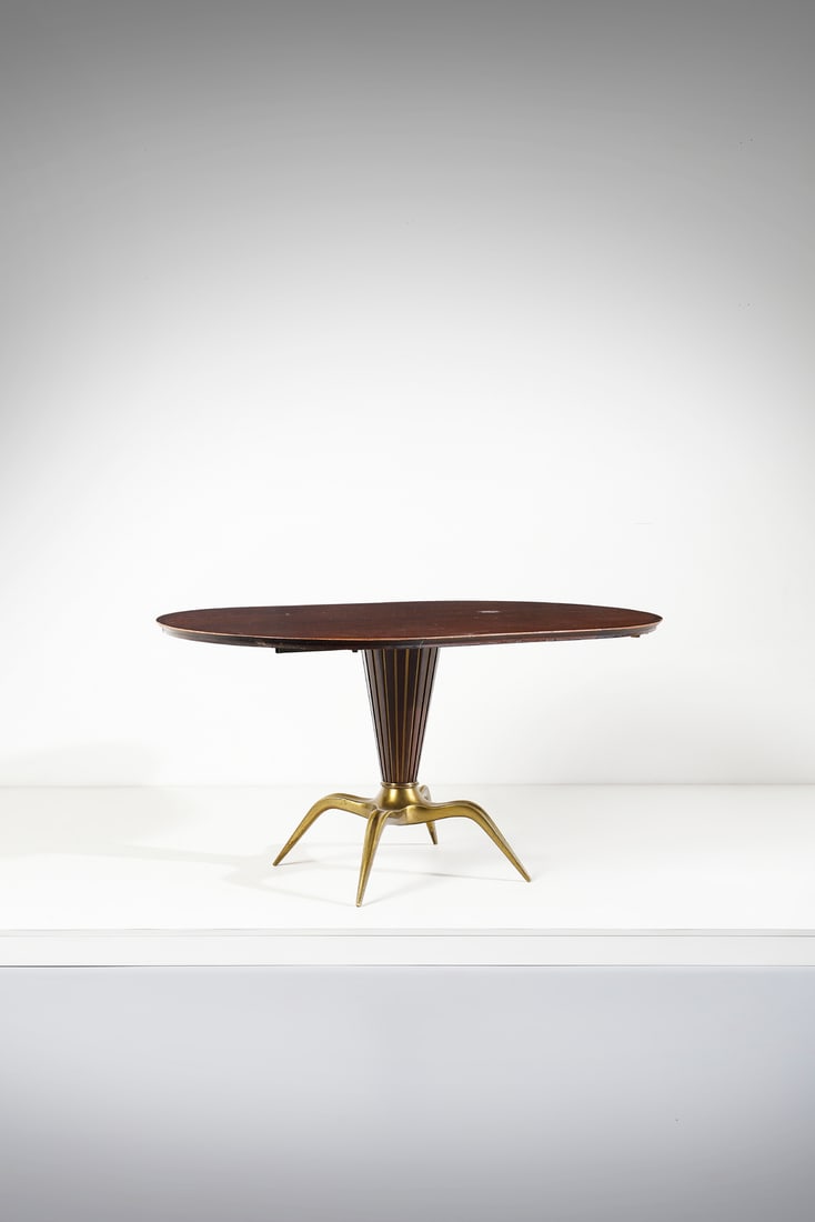 MELCHIORRE BEGA Extendable table.: BEGA MELCHIORRE (1898 - 1976) Extendable table. Wood and brass.. Cm 150,00 x 78,00 x 92,00. 1950s.Literature (different top): Catalogo Altamira 1954, p. 9