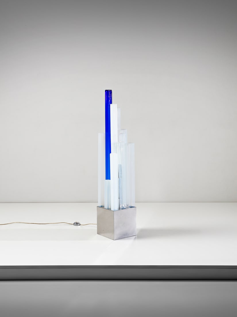 ANGELO BROTTO Ursula floor lamp for Esperia, Poggibonsi.: BROTTO ANGELO (1914 - 2002) Ursula floor lamp for Esperia, Poggibonsi. Chromed metal and glass.. Cm 24,00 x 122,00 x 24,00. 1970s.