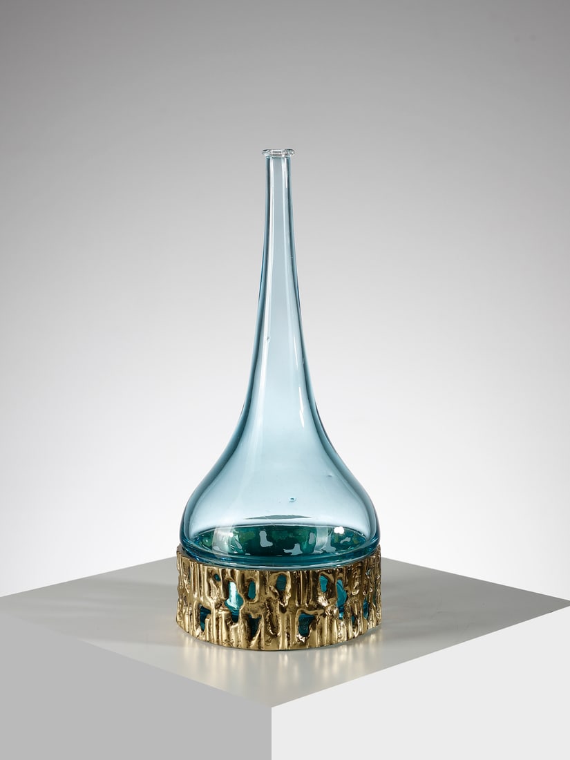 ANGELO BROTTO Bottle for Esperia, Poggibonsi.: BROTTO ANGELO (1914 - 2002) Bottle for Esperia, Poggibonsi. Brass and glass.. Cm 17,00 x 43,00 x 17,00. 1970s.Signed on the brass.