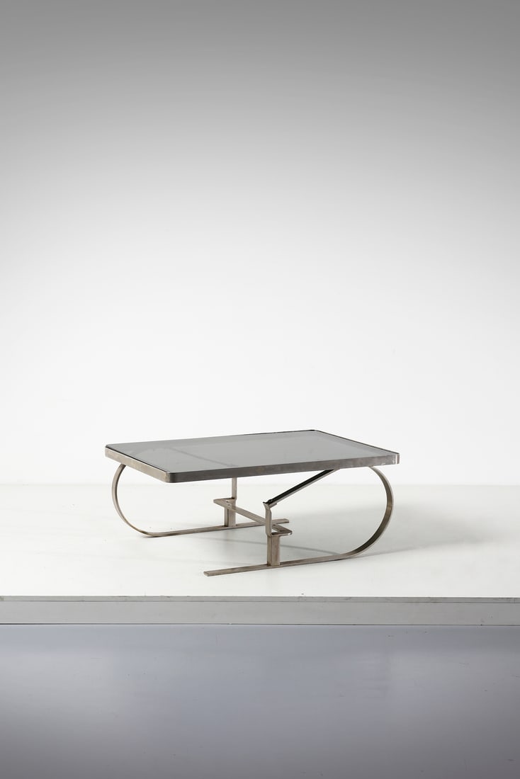 MANIFATTURA ITALIANA Coffee table.: ITALIAN WORK Coffee table. Steel and glass.. Cm 101,00 x 41,00 x 73,00. 1970s.