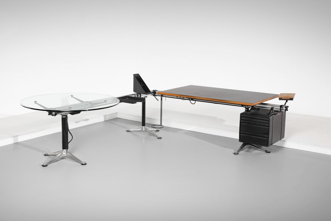 BRUCE BURDICK Large L-shaped desk from the Burdick Group series for Herman Miller, USA.: BURDICK BRUCE Large L-shaped desk from the Burdick Group series for Herman Miller, USA. Die-cast aluminum, steel, crystal, wood and plastic.. Cm 282,00 x 96,00 x 285,00. 1980s.