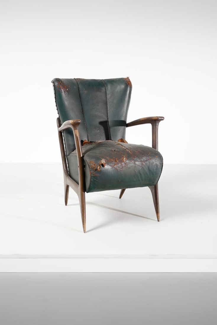 MANIFATTURA ITALIANA Armchair.: ITALIAN WORK Armchair. Wood and padded leatherette.. Cm 60,00 x 86,00 x 75,00. 1950s.