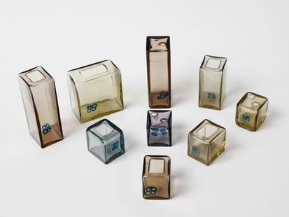 FULVIO BIANCONI Group of nine parallelepiped vases from the Oh, che bei! series for Luciano Vistosi,: BIANCONI FULVIO (1915 - 1996) Group of nine parallelepiped vases from the Oh, che bei! series for Luciano Vistosi, Murano. Light pagliesco clear glass and light blue clear glass with inclusion on one