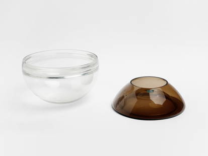 LUCIANO VISTOSI Fosca cup and centerpiece/flower holder, Murano.: VISTOSI LUCIANO (1931 - 2010) Fosca cup and centerpiece/flower holder, Murano. Crystal glass and smoked glass.. . 1960s.Manufacturing label.Dimensions: 17 x 29 x 29 cm; 10 x 27.5 x 27.5 cmLiterature:
