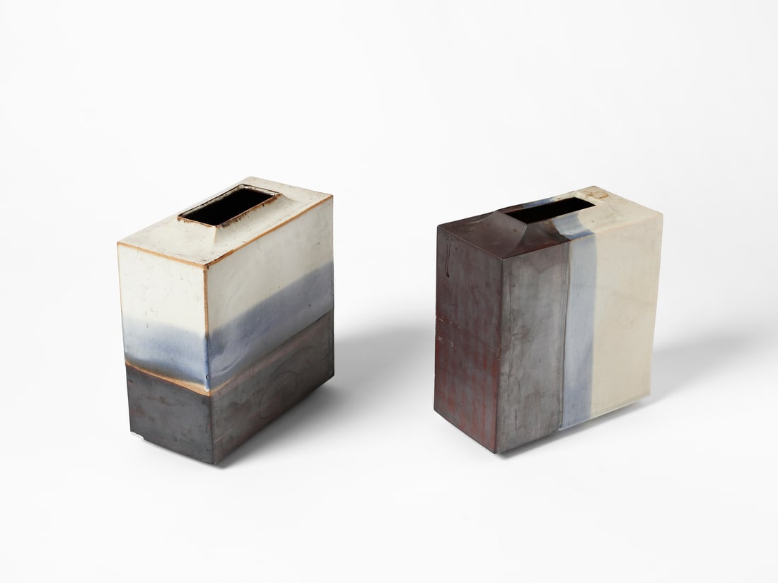 NANNI VALENTINI Two vases with banded decoration for Manifattura Ceramiche Arcore.: VALENTINI NANNI (1932 - 1985) Two vases with banded decoration for Manifattura Ceramiche Arcore. Brown, blue and white glazed stoneware.. Cm 21,00 x 25,00 x 11,00. 1970s.Signed "CA" under the base.