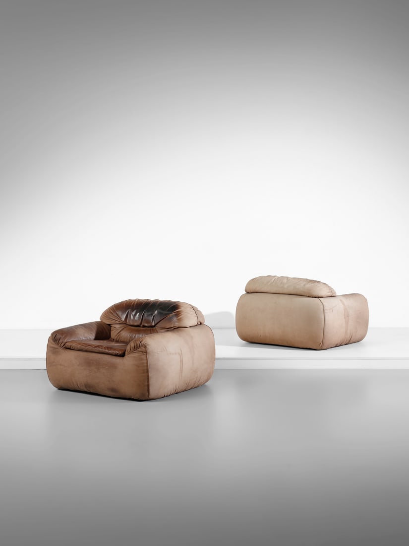 MANIFATTURA ITALIANA Pair of armchairs.: ITALIAN WORK Pair of armchairs. Padded leather.. . 1960s.