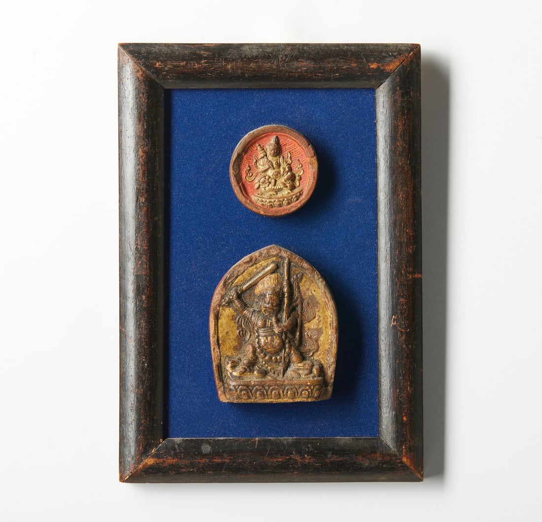 SMALL PICTURE CONTAINING TWO TIBETAN SEALS IN POLYCHROME TERRACOTTA Tibet, 19th century. (1 of 2)
