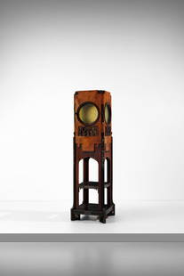 EUGENIO QUARTI Neo-Orientalist column with open shelves and display cabinet.: QUARTI EUGENIO (1867 - 1929) Neo-Orientalist column with open shelves and display cabinet. 1899. Wood, ebonized wood,, mother-of-pearl, metal, parchment and glass.. Cm 44,00 x 183,00 x 44,00. From the