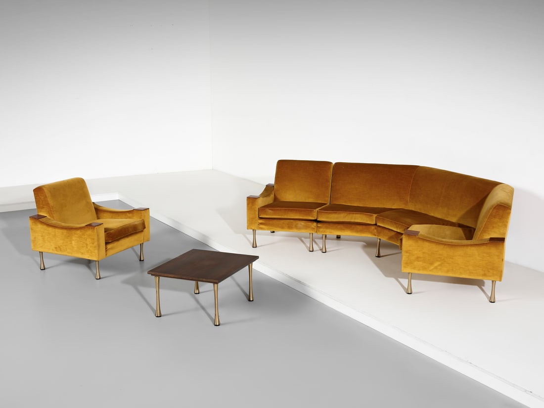 ANGELO MANGIAROTTI Modular living room composed of a three-seater curved sofa, two armchairs and a (1 of 2)