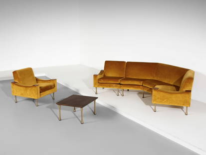 ANGELO MANGIAROTTI Modular living room composed of a three-seater curved sofa, two armchairs and a: MANGIAROTTI ANGELO (1921 - 2012) Modular living room composed of a three-seater curved sofa, two armchairs and a coffee table for La Sorgente dei Mobili, Italy. Wood, painted brass and padded fabric..