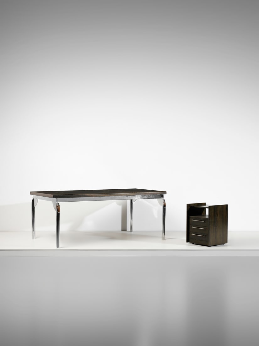 CARLA VENOSTA Large desk with chest of drawers on wheels.: VENOSTA CARLA (n. 1926) Large desk with chest of drawers on wheels. Chromed steel and painted rosewood.. . 1980s.Dimensions: desk 78,5 x 200 x 112 cm; drawers on wheels 62,5 x 45 x 45 cm