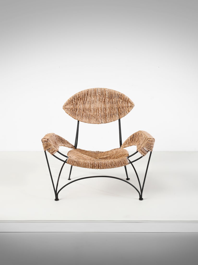 TOM DIXON Poltrona mod. Fat Chair per Cappellini international, Italia.: DIXON TOM (n. 1959) Poltrona mod. Fat Chair per Cappellini international, Italia. 1991. Ferro verniciato e paglia intrecciata.. Cm 94,00 x 90,00 x 84,00. Bibliografia: G. Gramigna, Repertorio del desi