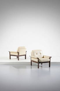 MANIFATTURA FRANCESE Pair of armchairs.: FRANCE MANUFACTURE Pair of armchairs. Wood and padding skai.. Cm 72,00 x 73,00 x 78,00. Second half of the 20th century.