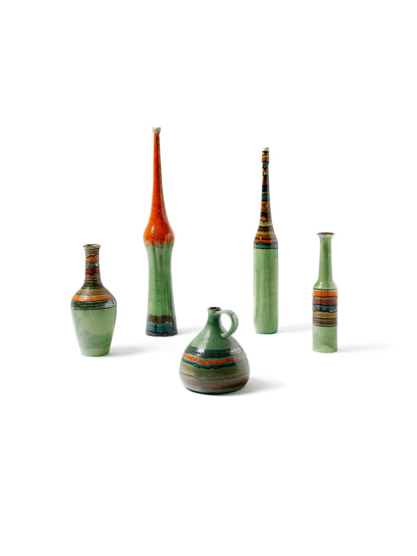 BRUNO GAMBONE A jug and four bottles of different shapes and sizes with horizontal band decorations,: GAMBONE BRUNO (1936 - 2021) A jug and four bottles of different shapes and sizes with horizontal band decorations, Florence. Glazed ceramic in shades of orange, red, brown, green/blue and black on a g