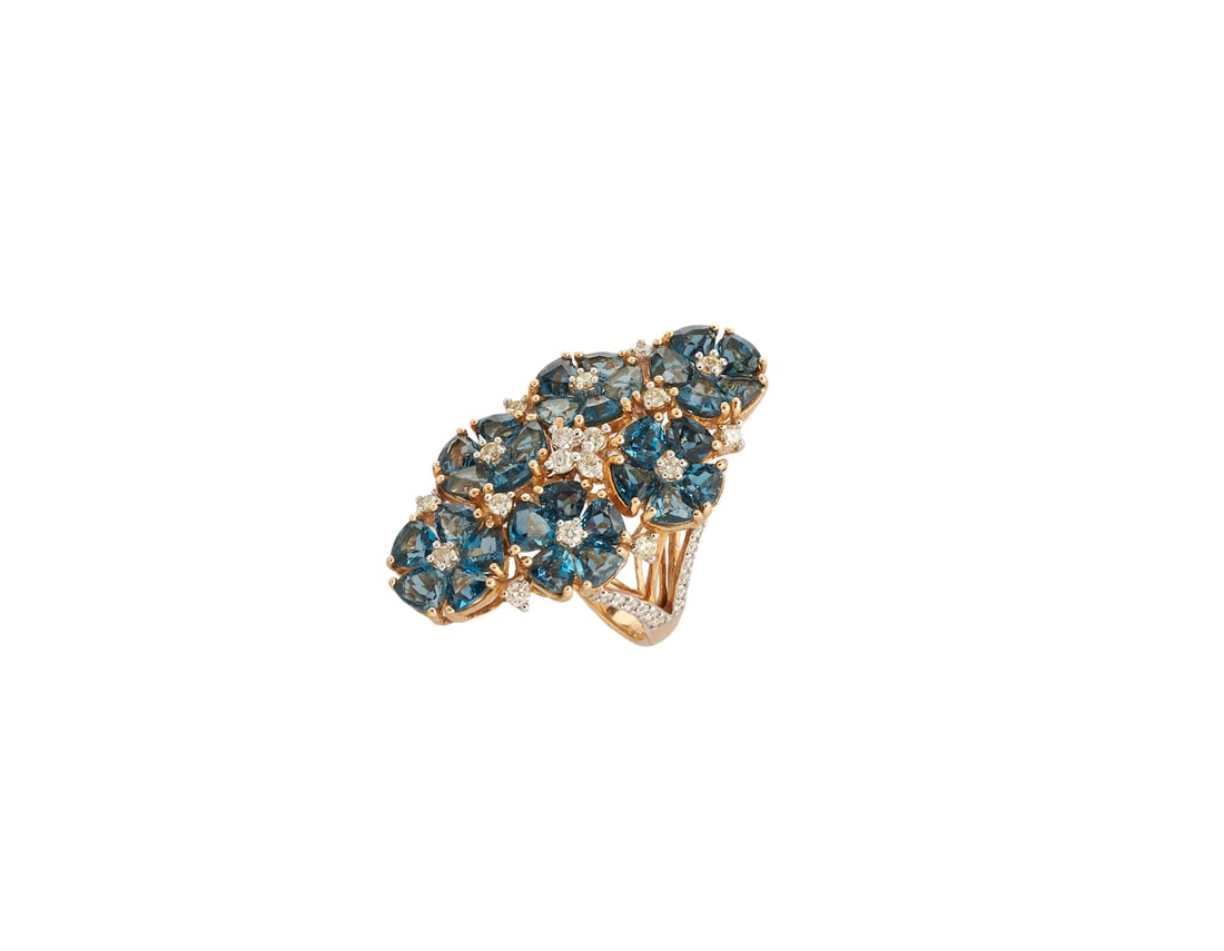 14k gold ring with diamonds and blue topaz.