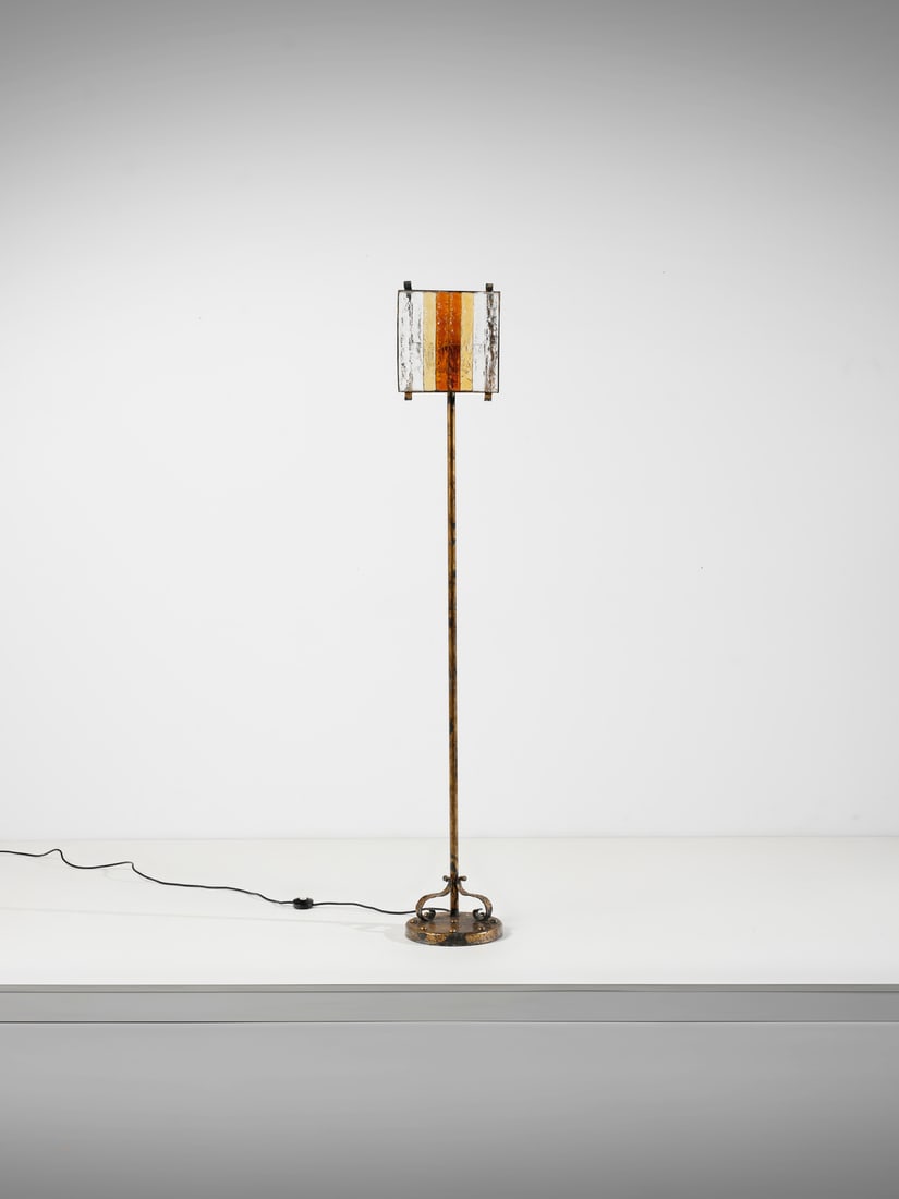 POLIARTE Floor lamp, Verona.: POLIARTE Floor lamp, Verona. Brass-plated metal, clear, yellow and amber chiselled glass and opal glass.. Cm 29,00 x 189,00 x 29,00. 1970s.