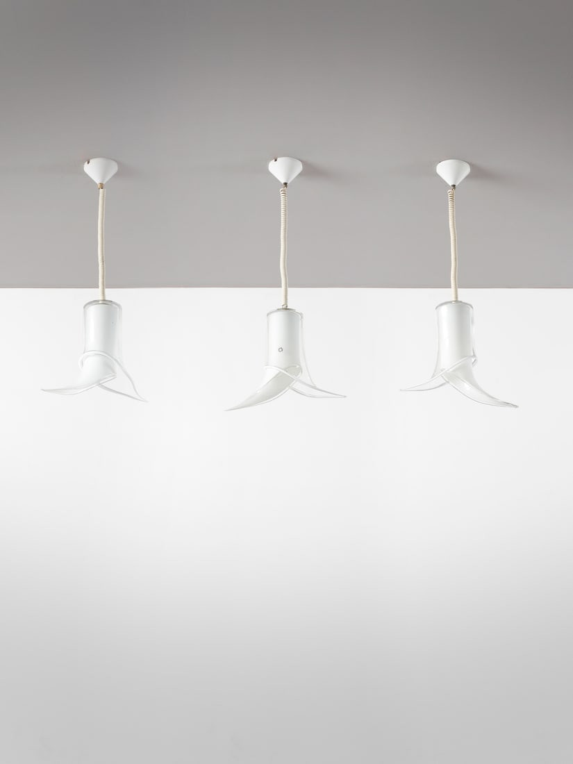 RENATO TOSO Three Fiore ceiling lamps for Leucos, Murano.: TOSO RENATO (n. 1940) Three Fiore ceiling lamps for Leucos, Murano. Clear, colorless and lattimo glass and plastic material.. Cm 41,50 x 31,00 x 13,00. 1970s.Production label.