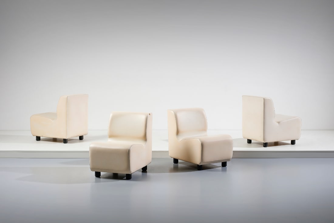 MANIFATTURA ITALIANA Four lounge chairs.: ITALIAN WORK Four lounge chairs. Wood, padded skai and plastic.. Cm 52,00 x 71,00 x 72,00. 1970s.