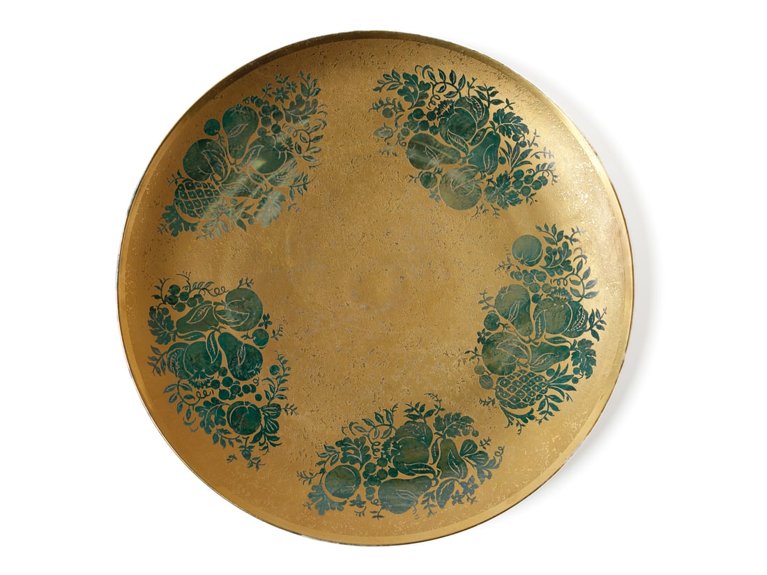 FINZI Centerpiece plate with fruit decorations, Italy.: FINZI Centerpiece plate with fruit decorations, Italy. White ceramic with green and pure gold decorations.. Cm 33,50 x 33,50. XXth century.Marked on the back.