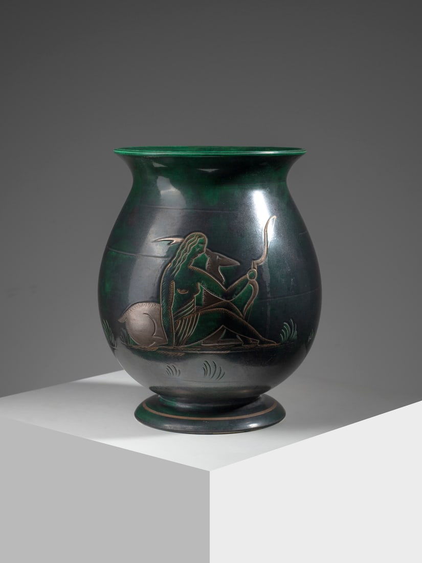 MANIFATTURA GALVANI Vase decorated with Diana the Huntress and an antelope, Pordenone.: GALVANI MANUFACTURE Vase decorated with Diana the Huntress and an antelope, Pordenone. Green glazed ceramic with gold and metallic luster decoration.. Cm 26,00 x 31,00 x 26,00. 1930s.Mark with manufac