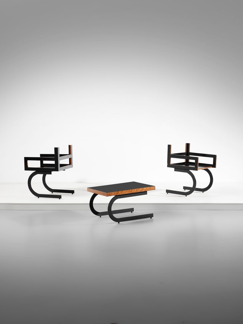 MANIFATTURA ITALIANA Two armchairs and a coffee table. (1 of 2)