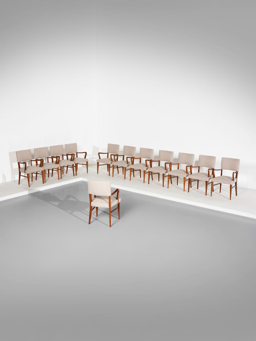 MANIFATTURA ITALIANA Twelve chairs with armrests.: ITALIAN WORK Twelve chairs with armrests. Wood and padded fabric.. Cm 57,00 x 93,00 x 56,00. 1950s.