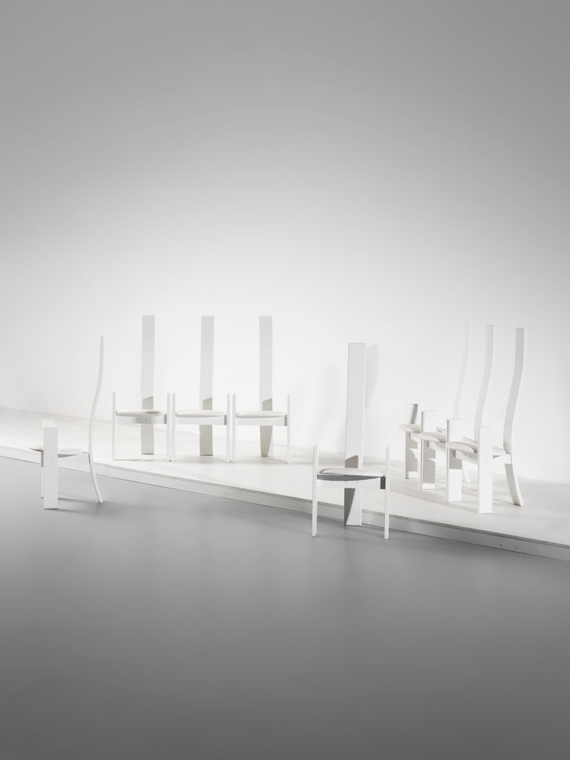 VICO MAGISTRETTI Eight Golem chairs for Poggi, Pavia.: MAGISTRETTI VICO (1920 - 2006) Eight Golem chairs for Poggi, Pavia. 1968. Lacquered wood and padded leather.. Cm 50,00 x 126,50 x 55,00. Literature:Domus n. 488, luglio 1970, p. 34; G. Gramigna, Reper