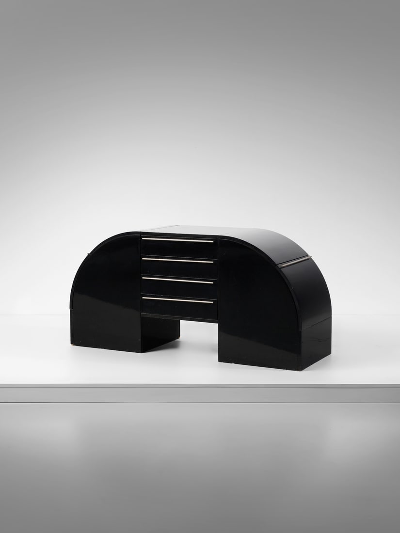 MANIFATTURA ITALIANA Arched storage unit with drawers and drop-down cabinets.: ITALIAN WORK Arched storage unit with drawers and drop-down cabinets. Lacquered wood and metal.. Cm 150,00 x 73,00 x 50,00. 1970s / 1980s.