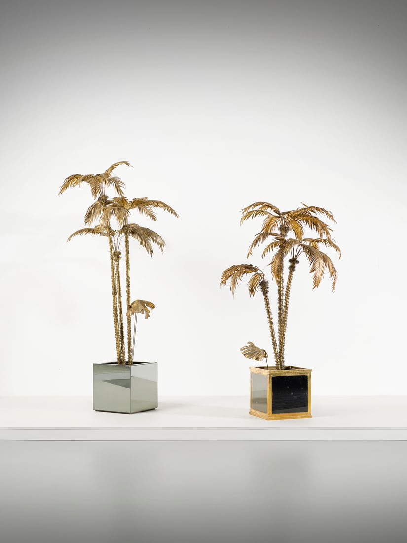 MANIFATTURA ITALIANA Two palm sculptures.: ITALIAN WORK Two palm sculptures. Metal, brass, mirrored glass, colored glass and wood.. . 1970s.Dimensions: 180 x 100 x 100 cm; 215 x 110 x 110 cm