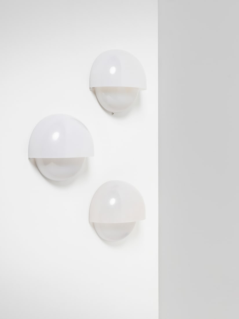 VICO MAGISTRETTI Three Mania wall lamps for Artemide, Milan.: MAGISTRETTI VICO (1920 - 2006) Three Mania wall lamps for Artemide, Milan. 1963. Painted metal and methacrylate.. Cm 29,50 x 29,50 x 13,50. Literature: G. Gramigna, Repertorio del design italiano 1950