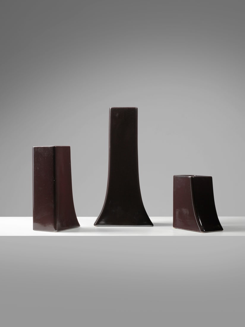 ANTONELLO MOSCA Three vases, execution by Fratelli Brambilla.: MOSCA ANTONELLO Three vases, execution by Fratelli Brambilla. Brown underglazed ceramic.. . Milan, 1968.Manufacturer's mark under the base.Dimensions: 30 x 15 x 7 cm; 20 x 11 x 7 cm; 13 x 11 x 7 cm