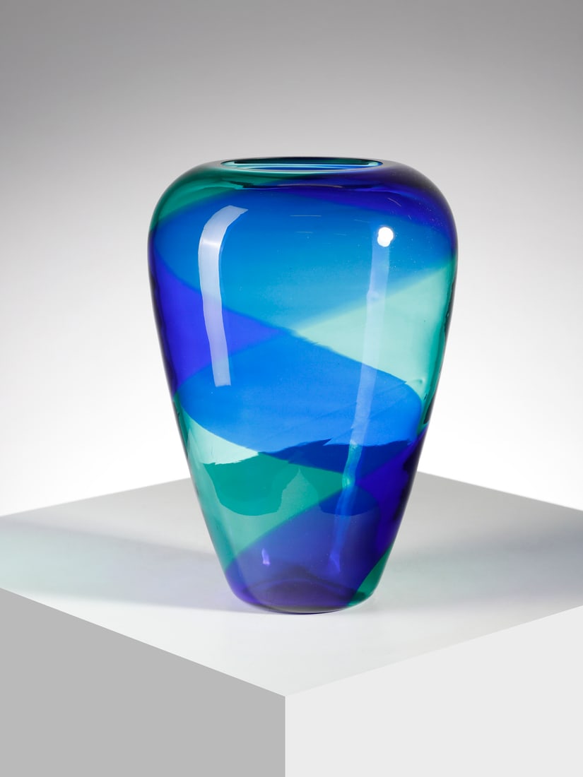 MANIFATTURA MURANESE Vase.: MURANO WORK Vase. Clear aqua green glass decorated with a blue spiral band.. Cm 18,00 x 26,00 x 18,00. Second half of the XXth century.