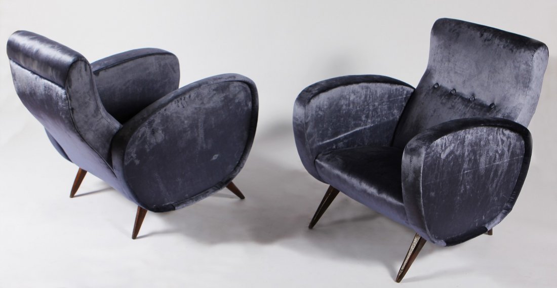 PIERLUIGI GIORDANI Attribuito a. Coppia di poltrone.: GIORDANI PIERLUIGI (Attribuito a.) Coppia di poltrone. Legno e tessuto. Cm 82,00 x 75,00 x 72,00. Anni '50.