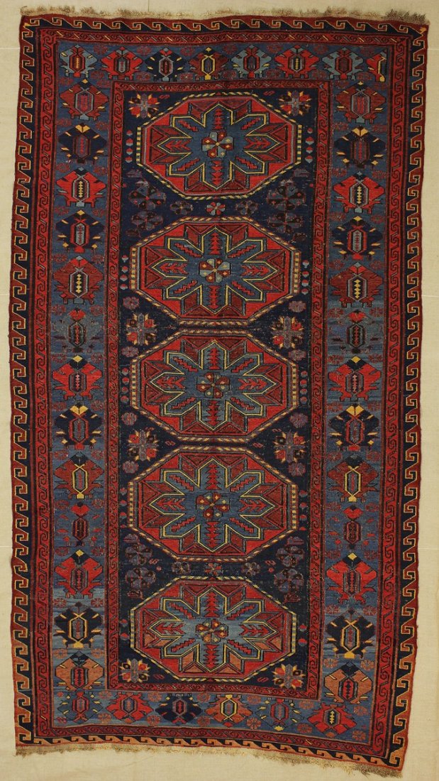 SUMAK Caucaso.1930 circa. Fondo blu, cinque ottagoni (: SUMAK Caucaso.1930 circa. Fondo blu, cinque ottagoni ( Crivelli Star), fondo azzurro. Conservazione buona. 1930. Tappeto. Cm 159,00 x 284,00.