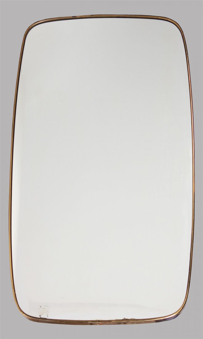 GIO' PONTI Attribuito a. Specchio con cornice in: PONTI GIO' (1891 - 1979) Attribuito a. Specchio con cornice in ottone. Vetro e ottone. Cm 54,00 x 94,00 x 3,00. Anni '50.