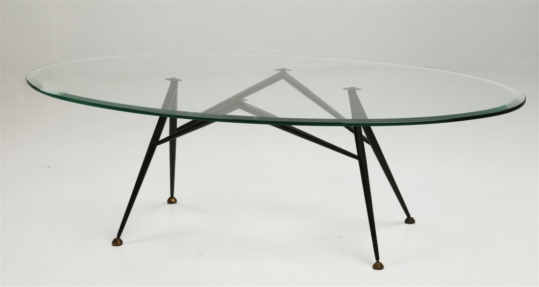 MANIFATTURA ITALIANA DEL XX SECOLO Tavolino.: MANIFATTURA ITALIANA DEL XX SECOLO Tavolino. Metallo, vetro. Cm 135,00 x 40,00 x 75,00. Anni '50. Cornice presente