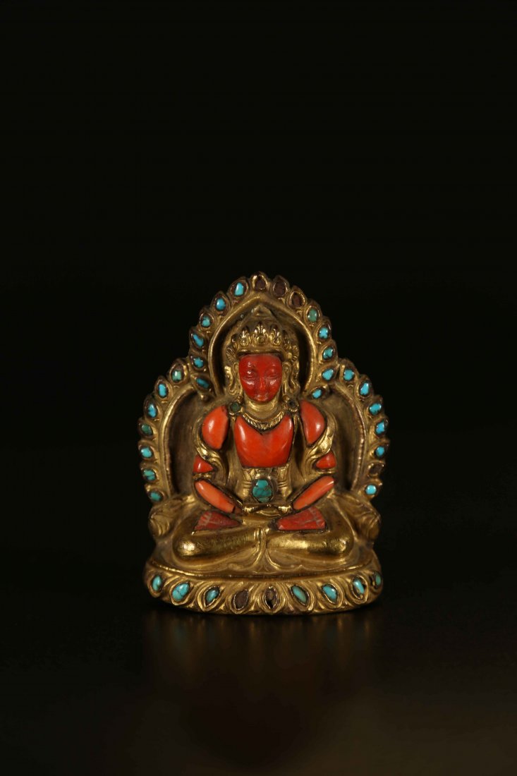 Arte Himalayana A gilt bronze embossed statue: Arte Himalayana A gilt bronze embossed statue depicting Amitayus with coral and turquoise Nepal, 19th century . . Cm 7,00 x 10,00 x 1,00. A fine statue depicting Amitayus made out of coral, seated on 