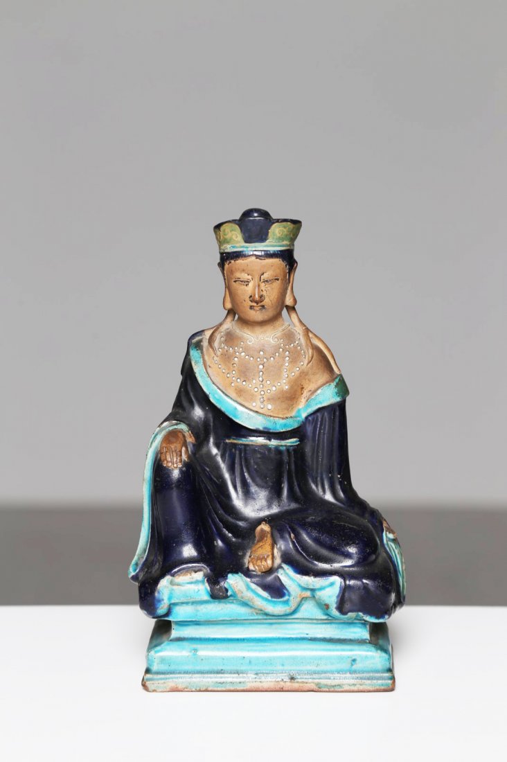 Arte Cinese Aubergine glazed earthenware GuanyinChina,: Arte Cinese Aubergine glazed earthenware GuanyinChina, Ming period, 16th century. . Cm 23,00.