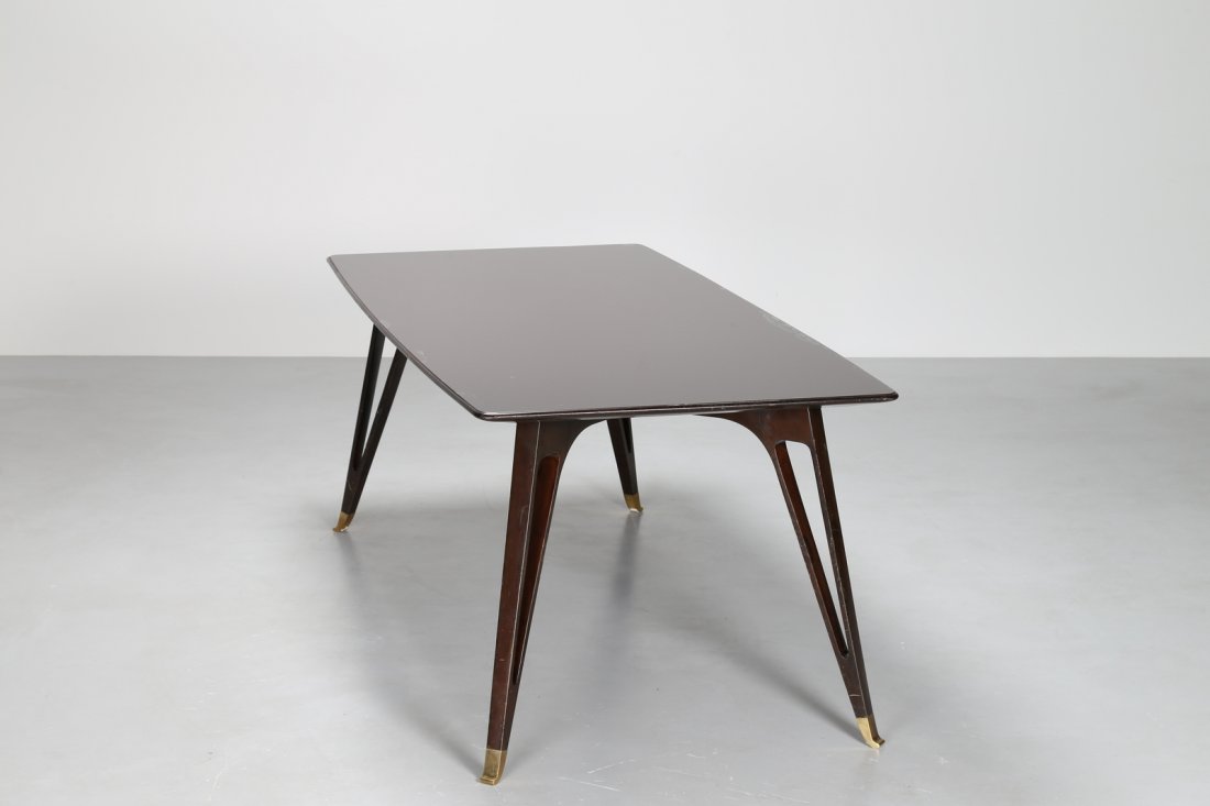 LADISLAO KOVACS Table in mahogany and glass with brass: KOVACS LADISLAO Table in mahogany and glass with brass ferrules, made by Kovacs Jannace, 1950. mahogany wood, glass and brass. Cm 195,00 x 77,00 x 93,00.