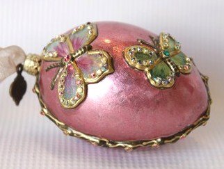 Jay Strongwater Crystal Ornament- Dragonfly & Butt: Jay Strongwater Dragonfly & Butterfly Ornament. Oval Shaped???? Colors include: pearl pink, green, and gold. Measures approximately 4 x 2.5