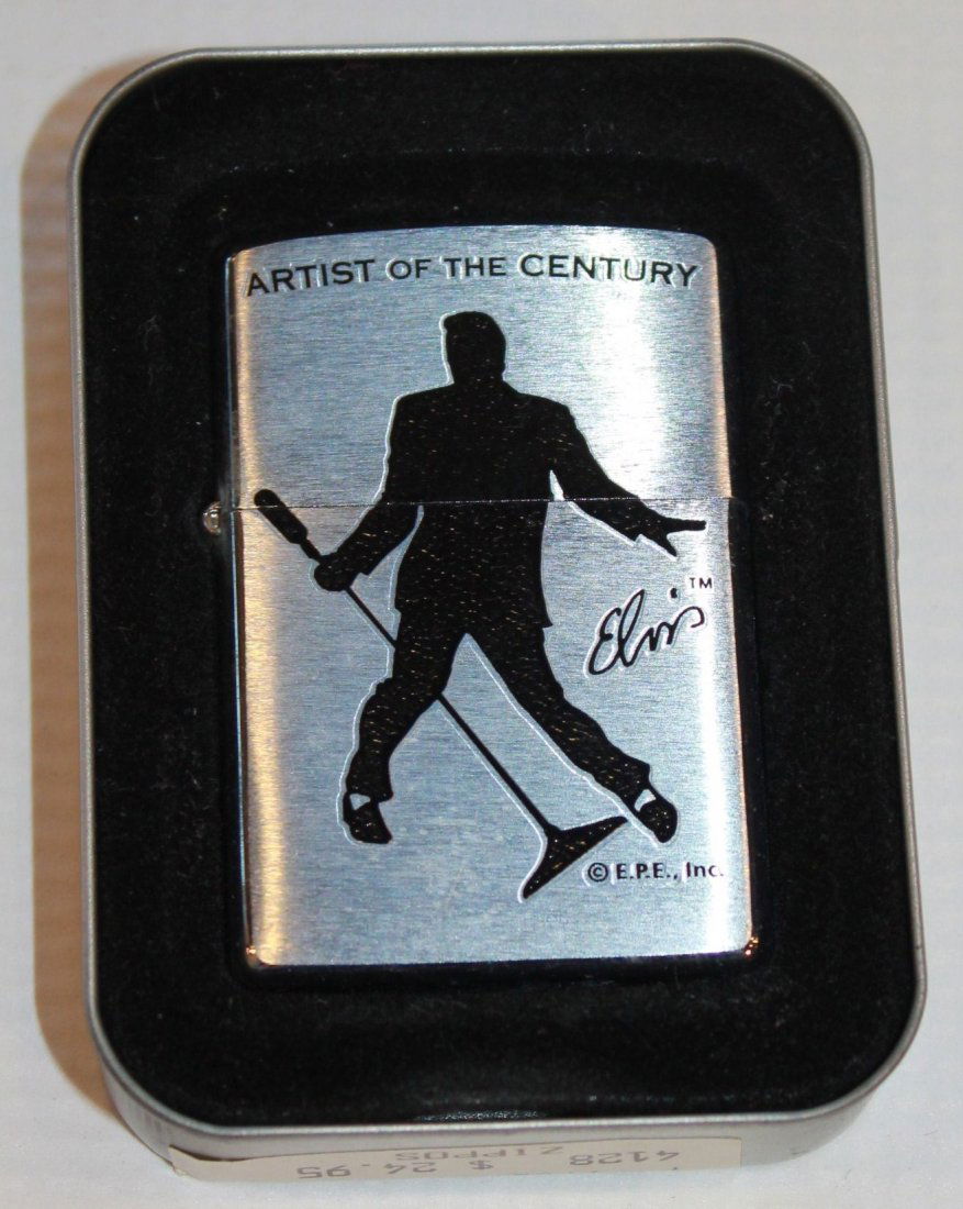 Lot of Three Elvis Lighters/Zippos Elvis "Artist o: 1. ELVIS Zippo 200EP.402 "Standing". Brand new in Original Tin. 2. Elvis heart emblem street chrome zippo. Brand new in Original Tin. 3. 2000 Zippo Elvis Presley "King of Rock 'N Roll Matte Finish Lig