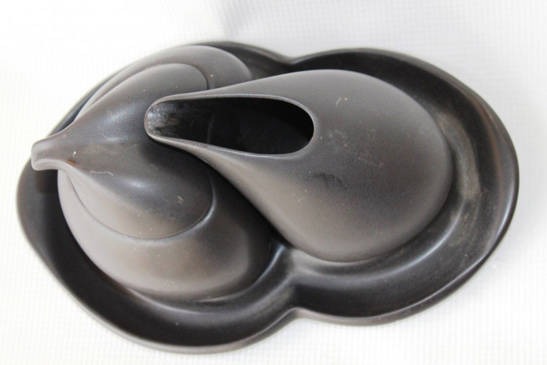 Peter Saenger Sugar, Creamer and Tray Set: All black opaque porcelain Modernism creamer and sugar set by Peter Saenger. Matte glaze. This sleek and modern design was featured on Star Trek- The Next Generation television series. Signed Saenger