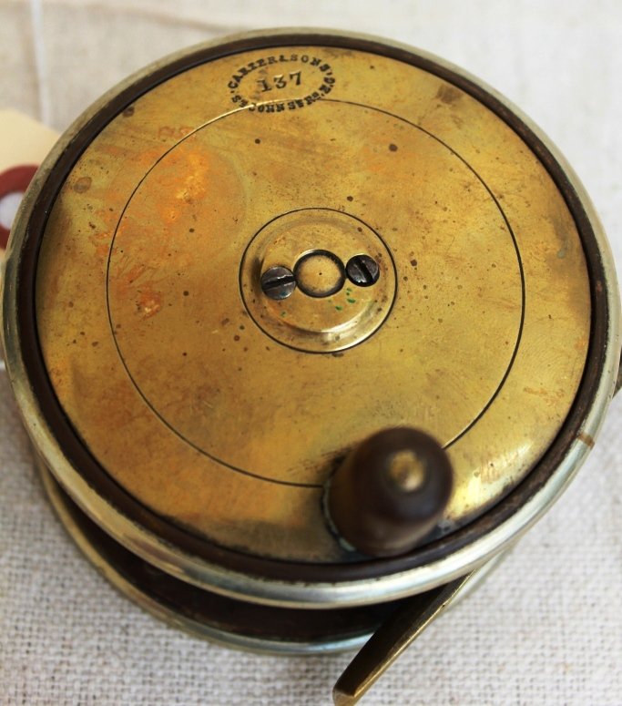 Carter & Sons Brass & Ebonite Trout Reel: Carter & Sons Brass & Ebonite Trout Reel from London. St. John St - 137". This 3 1/2" diameter. Circa 1890's.
