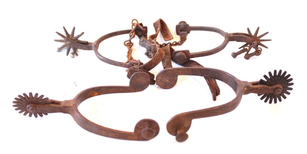 Lot of Antique Spurs: Two Pair of Antique Spurs. Includes original chain and leather.