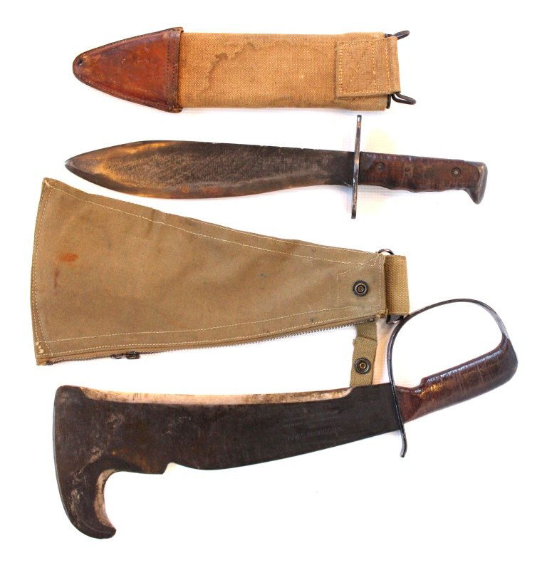WWII Era Lot of Machette and Scabbard: WWII Woodman's Pal Machette #280 Trademarked Pat. #2335497 by Victor Tool Co. Reading, PA with canvas sheath and 1918 style Scabbard engraved with A.E.