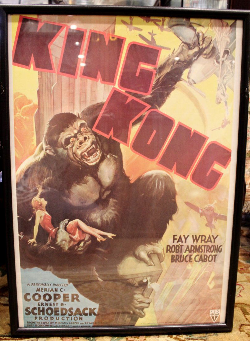 King Kong Framed Classic Movie Art: Rare vintage "King King" Movie poster measuring approximately 21 inches wide x 29 1/2 inches high. This is a quality reproduction done in 1976 of the famous movie from 1933.
