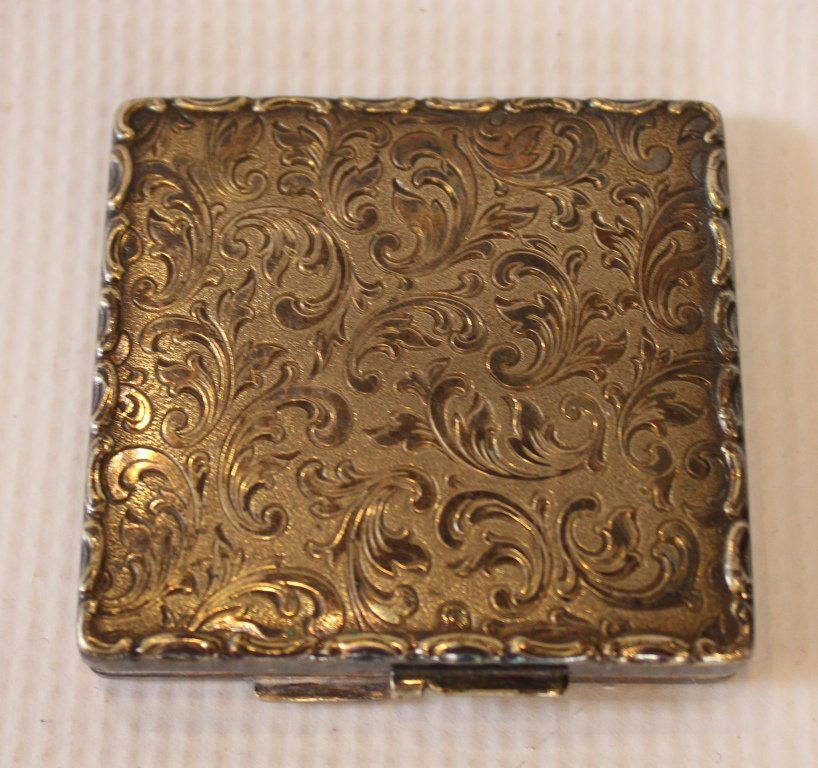 Silver Paisley Design Powder Case: Silver Paisley Design Podwer Case by Kraftalpacca. Markings are on clasp. Other markings on clasp not readable due to the fact that they are only half visible; the other half under closure. Original e