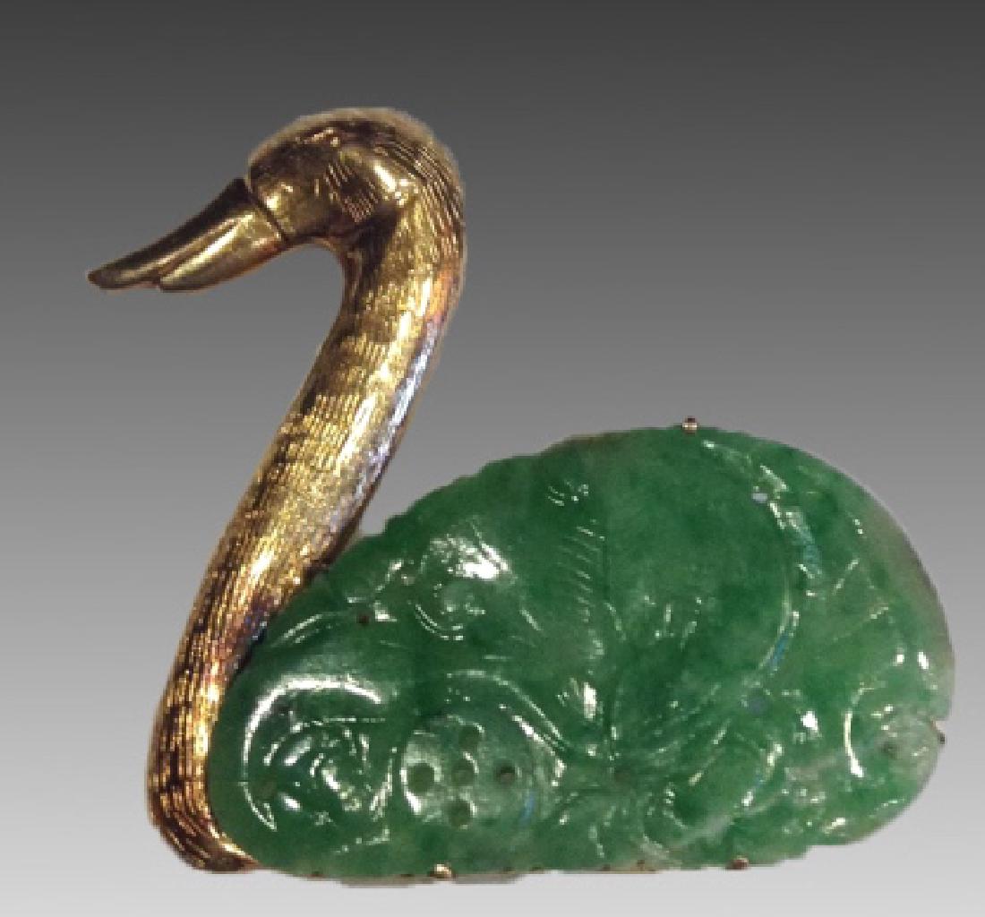 CHINESE ANTIQUE 14KYG & JADE DUCK BROOCH: Antique Chinese 14k yellow gold brooch in the shape of a duck with its body a piece of pierced imperial jadeite jade. 6 grams.