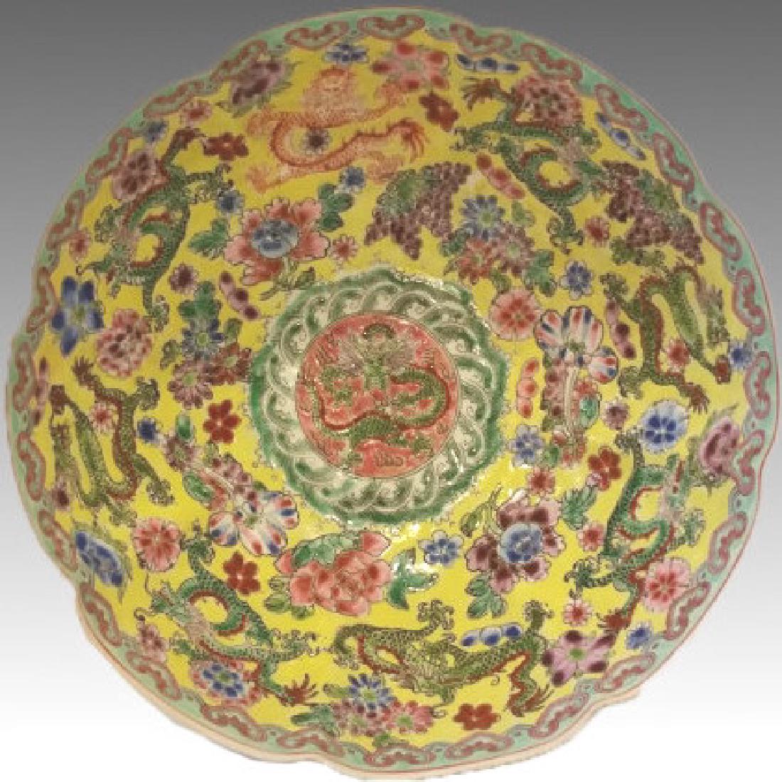 CHINESE DRAGON EGGSHELL BOWL: Chinese eggshell porcelain bowl with enamel painted design of dragons and flowers on yellow ground. 3" x 7.5"